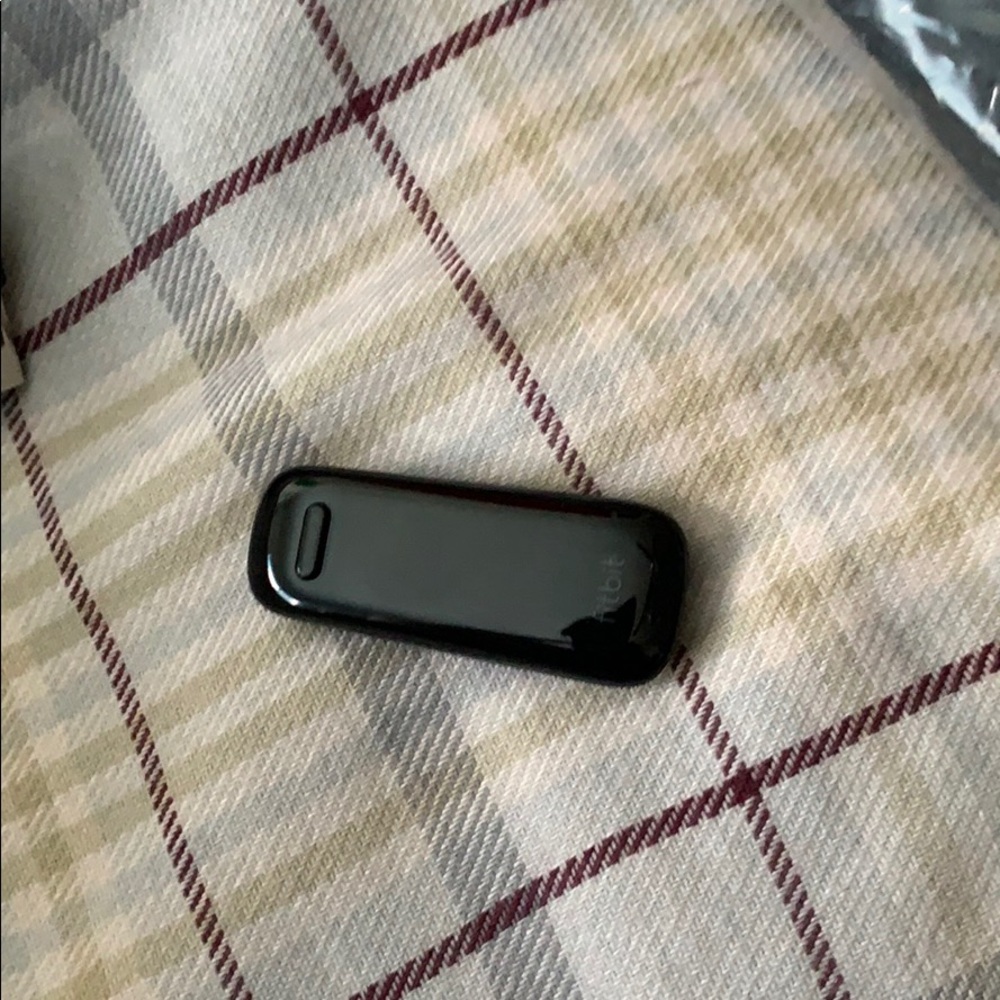 Wireless Fit bit one with accessories